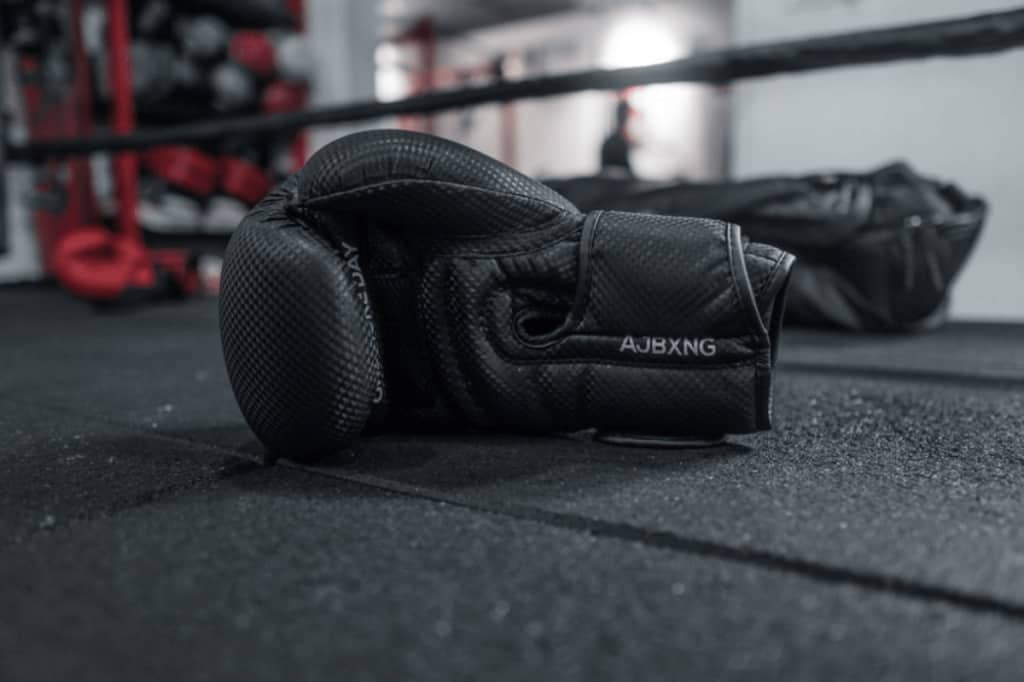 Boxing gloves in boxing ring