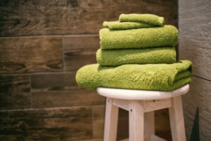 Stack of towels on a stool