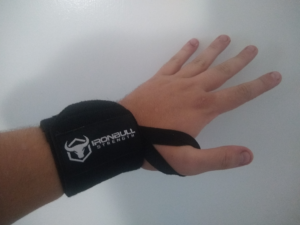 Wearing wrist wraps for weight training